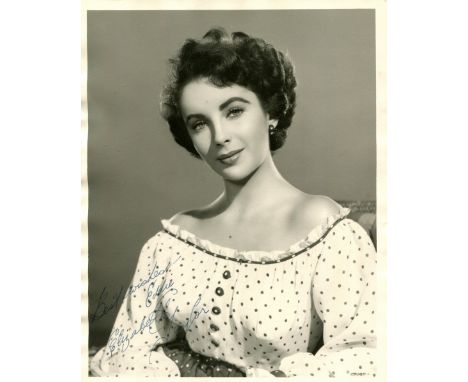 TAYLOR ELIZABETH: (1932- 2011) English actress, Academy Award winner. A good vintage signed and inscribed 8 x 10 photograph o