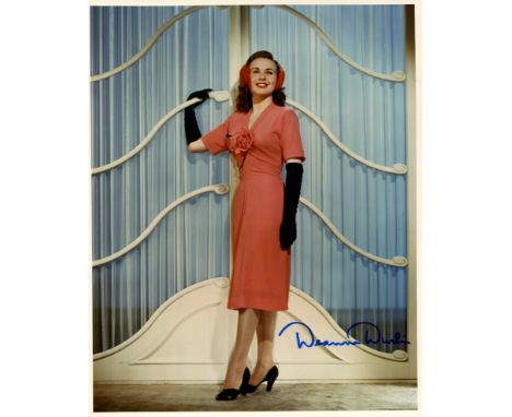 ACTRESSES: Deanna Durbin (1921-2013) Canadian-born actress and singer. Signed colour 8 x 10 photograph of Durbin standing in 