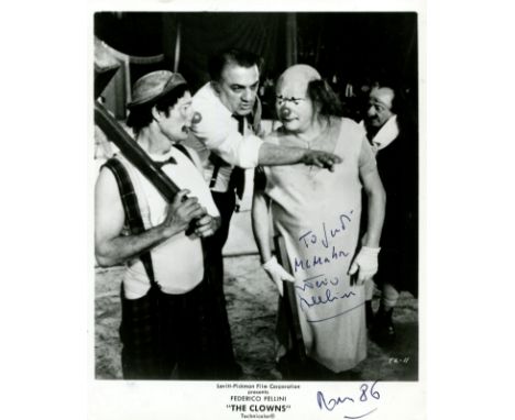 FELLINI FEDERICO: (1920-1993) Italian film director, Academy Award winner. Signed and inscribed 8 x 10 photograph of Fellini 