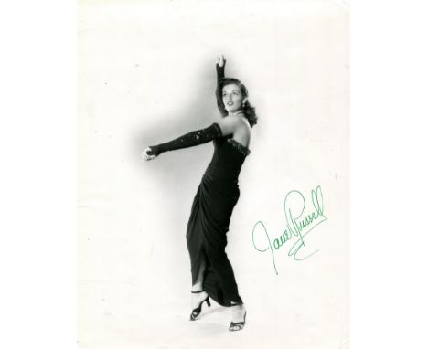 RUSSELL JANE: (1921-2011) American actress and sex symbol. A good vintage signed 8 x 10 photograph of Russell wearing an eleg