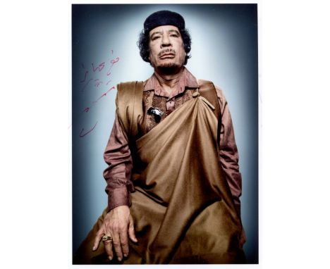 GADDAFI MUAMMAR: (1942-2011) Leader of the Libyan Arab Republic 1969-77 and ˜Brother Leader'' of the Libyan Arab Jamahiriya 1