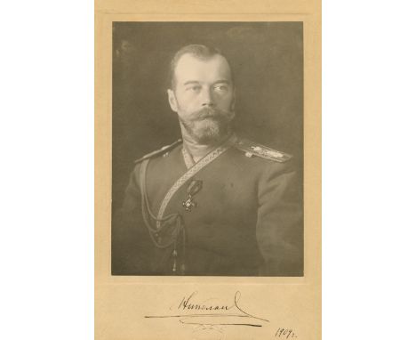 NICHOLAS II OF RUSSIA: (1868-1918) Emperor of Russia 1894-1917. A rare and exceptional signed 7 x 11 photograph by the Tsar, 