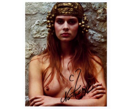 KINSKI NASTASSJA: (1961- ) German-born Actress. Signed colour 8 x 10 photograph, an artistic image of the actress in a half-l