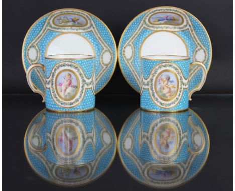 A pair of Sevres porcelain bleu celeste pointille cans and saucers, circa 1770, each of cylindrical form, the cups painted wi