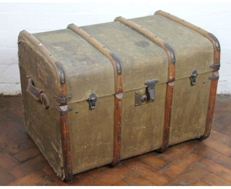 A vintage bent wood bound canvas trunk, with brass clasps, leather handles and striped interior, 48cm x 68cm x 48cm