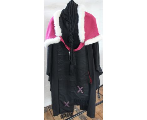 A graduation gown for Helen C Alexander of St Marys College University of St Andrews, the gown by R. W. Forsyth Edinbugh; wit