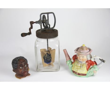 A 19th century comical Toby teapot and cover, 18cm high, a novelty storage jar 11cm high and a Blow Butter Churn, 3 imperial 
