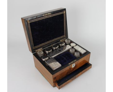 A Victorian walnut work box, the lid inset with a mother of pearl panel named for J. H. Stocks, the interior with mirror and 