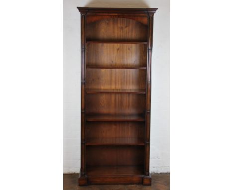 A modern mahogany open bookcase, with four adjustable and one fixed shelf, on plinth base, 194cm x 84cm x 34cm