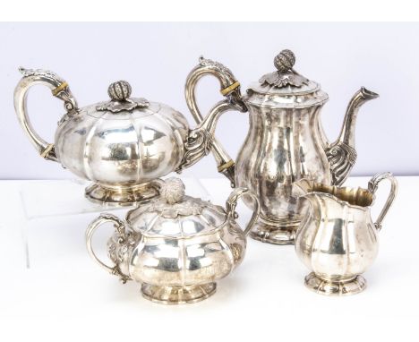 A good George IV silver four piece tea set by William Eaton, comprising melon shaped teapot, covered sugar basin and milk jug