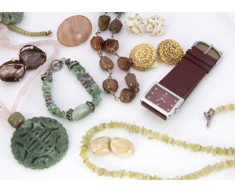 A collection of hardstone and costume jewels, including amethyst bolder necklace, rose quartz necklaces, two ladies fashion w
