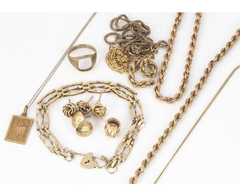 A collection of 9ct gold jewellery, including an Aries pendant and chain,  three bar gate link bracelet, various broken chain