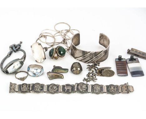 A collection of silver jewels, including a silver bangle, a silver ladies fashion watch, a silver ingot pendant, a pair of Da