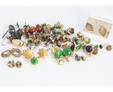 A collection of yellow metal ear studs, various carats, including some set with gems, dyed jadeite jade and other items (a pa