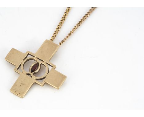 A contemporary 9ct gold and garnet cross pendant, centred with a marquise cut garnet, marked to reverse VJG for Vicki Tully, 