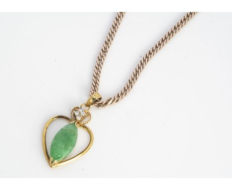 A continental jadeite jade and white sapphire pendant, on a 9ct gold flattened curb linked necklace, 26.5 cm 10g