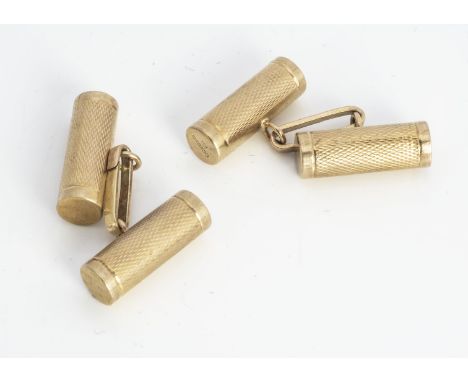 A pair of 9ct gold cylinder cufflinks, engine turned decoration, 2cm by 0.5cm, 9g