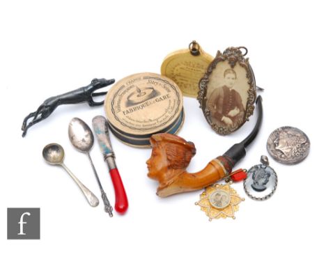 A 19th century Meerschaum pipe and various collectors items to include an Elite appointment register, an easel framed photogr