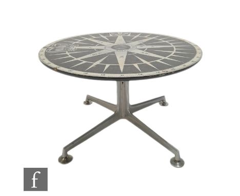 A 1960s laminated occasional table of circular form, the top detailed with an image of an 18th Century Azimuth compass, raise