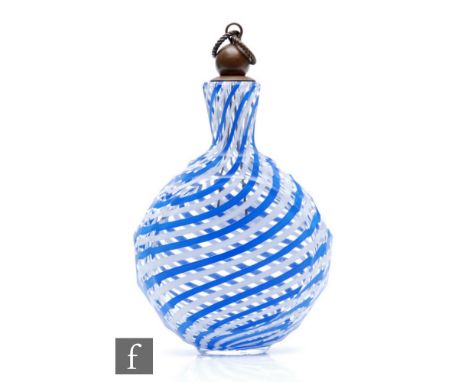 A Clichy type flat lay glass snuff bottle, of compressed ovoid form internally decorated with alternating bands of blue and o