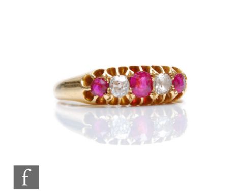 A 19th Century 18ct ruby and diamond five stone boat shaped ring, claw set stones to plain shoulders, weight 2.7g, ring size 