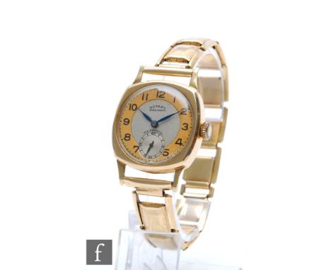 A 9ct hallmarked Rotary, manual wind wrist watch, Arabic numerals to a two tone dial, case diameter 28mm, to 9ct spring loade