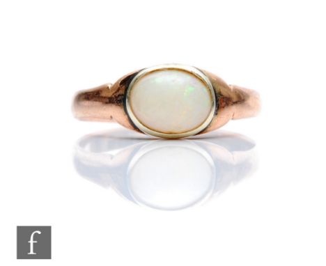 An early 20th Century 9ct single stone opal ring, collar set to a plain rose gold shank, weight 2g, ring size N. 