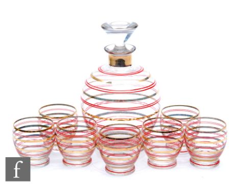 A mid 20th Century decanter of globular form with short collar neck, the body with alternating bands of gilt and red enamel d
