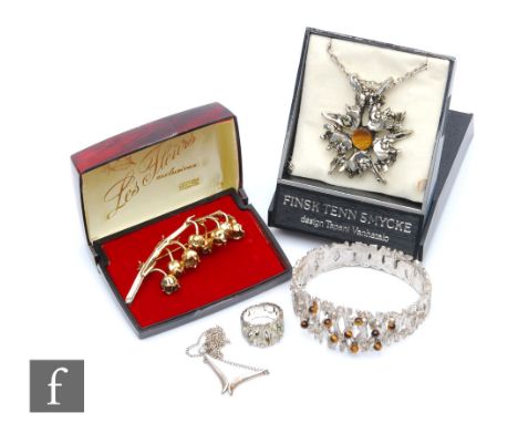A boxed brutalist necklace designed by Tapani Wanhatalo, set with a central tigers eye, together with a 925S brooch formed as