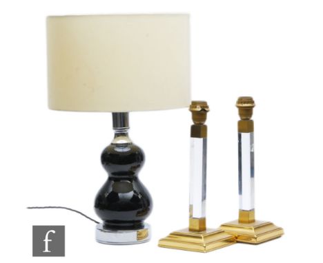 A later 20th Century table lamp of gourd form, in black with chrome details with cream shade, height 55cm, together with a pa