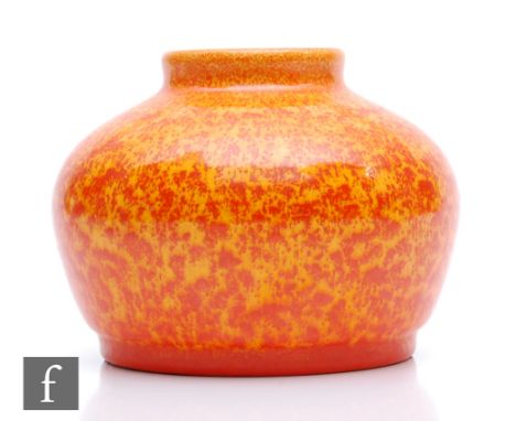 A Pilkingtons Royal Lancastrian shape 3183 vase of compressed form thrown by Edward T Radford and decorated in a tonal orange