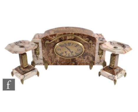 An French Art Deco coloured marble clock garniture with eight day movement striking on a bell oval dial gilt metal mounts on 