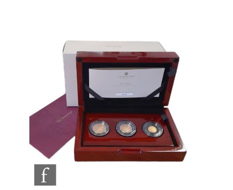 An Elizabeth II Three Coin Sovereign set comprising full, half and quarter sovereigns all dated 2022, certificate and cased. 