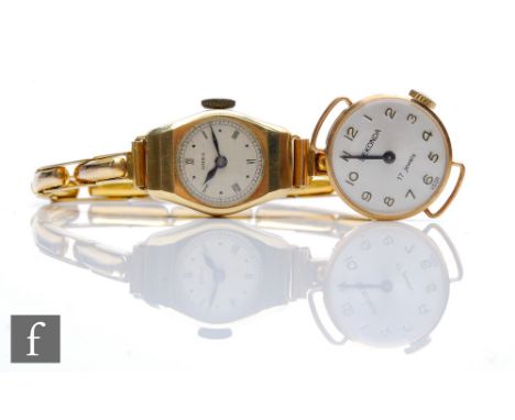 A lady's 9ct Doxa manual wind wrist watch to a 9ct spring loaded strap, with a similar Sekonda example, total weight 19.5g. (