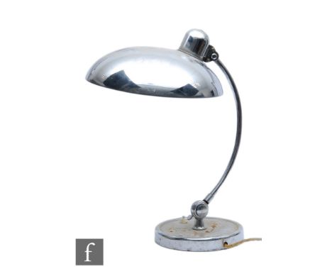 A Kaiser Idell Bauhaus industrial desk work lamp, circa 1930s, with steel and chrome-plated metal elements and a circular fla