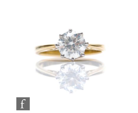 An 18ct diamond solitaire ring, brilliant cut stone, weight 1.19ct, colour J/K, clarity I1, claw set to knife edged shoulders