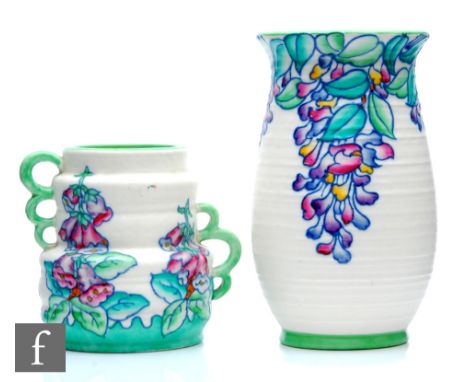 Two 1930s Art Deco Charlotte Rhead for Crown Ducal vases, the first decorated in the 4954 Wisteria pattern, the second in the