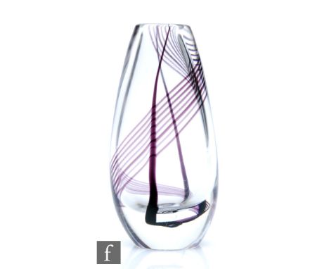 A post war Kosta glass vase of compressed tear drop form designed by Vicke Lindstrand and decorated with an internal spiral l