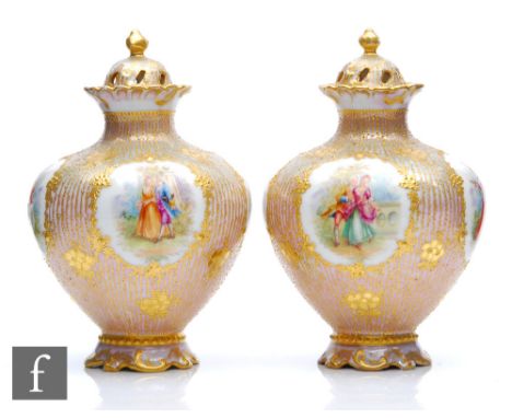 A pair of late 19th to early 20th Century Dresden porcelain vase and covers each decorated with hand painted Watteauesque sce