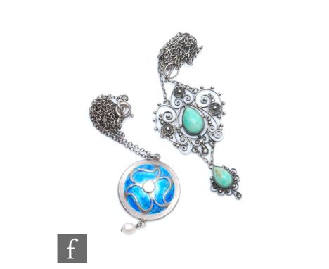 An early 20th Century Arts and Crafts white metal necklace, the domed pendant with blue and white enamel with a seed pearl dr