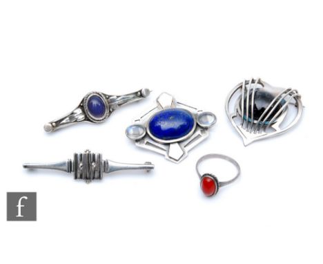 An early 20th Century Arts and Crafts style brooch set with a blue hardstone cabochon and two moonstones, together with a rin