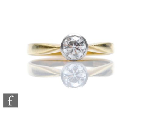 An 18ct hallmarked diamond solitaire ring, brilliant cut collar set stones, weight approximately 0.40ct, colour L/M, clarity 