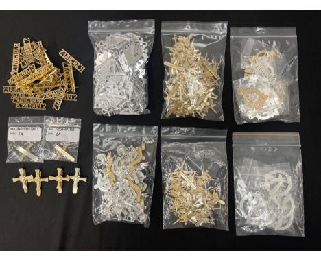 Quantity of new unissued ERII Queens Crown British Army Staybrite Cap Badges and Army Air Corps Collar Dogs. All new unissued