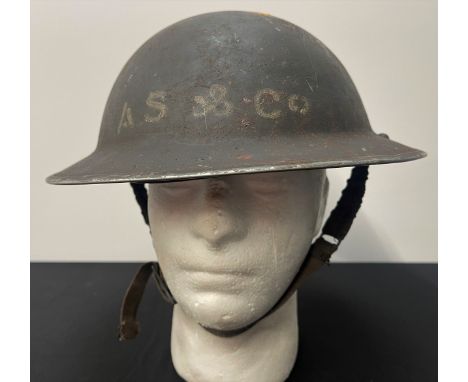 WW2 British Home Front Steel Helmet, dark grey painted external finish with stenciled to front "AS &amp; Co ". Light Grey int