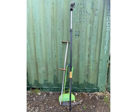 Selection of gardening tools to include: Wilkinson sword long reach pruner. Leaf collector and a long handle scythe. Please n