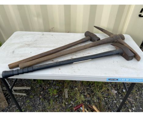 Selection of gardening tools to include: Wooden handle heavy duty mattock. Log splitting axe.  Wooden handle sledge hammer. P