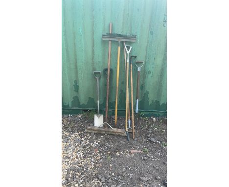 Selection of gardening tools to include: Yard broom. Plastic rake. 3 x hoes. 2 x forks and metal spade. Please note this lot 