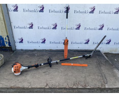 STIHL KM 94 RC multi tool long reach hedge cutter with chain saw attachment. Please note this lot has the standard Ewbank's s