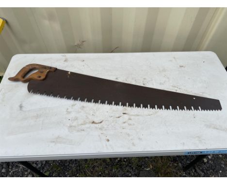Vintage wood saw.  Please note this lot has the standard Ewbank's standard buyers premium payable on top of the hammer price 