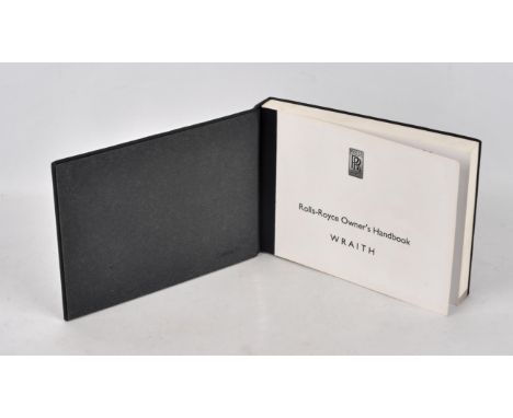 Rolls-Royce Wraith Coupe original leather Owners Handbook (published by Rolls-Royce 2015), with embossed interlinked RR on fr